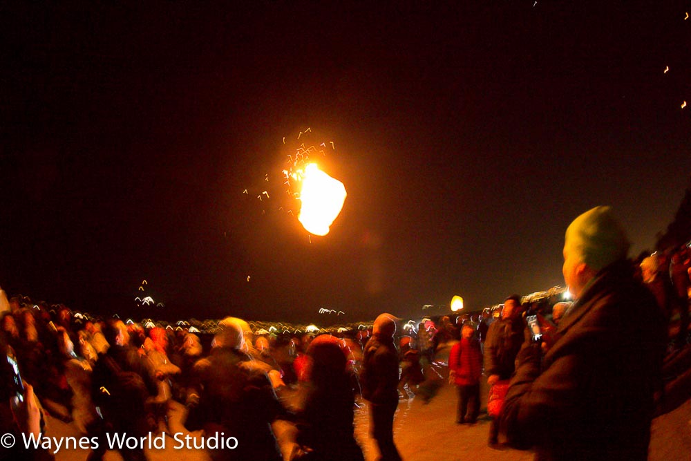 burning lantern landed into crowds