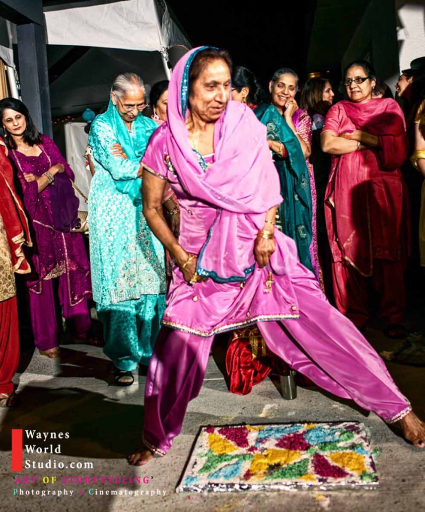 groom's Mom will step over the Kolam